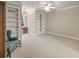 Bedroom with neutral color and built in bookshelves and a view to separate office at 240 Rose Ridge Dr, Canton, GA 30115