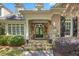 Inviting home entrance with stone accents and a double front door at 240 Rose Ridge Dr, Canton, GA 30115