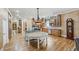 Gourmet kitchen featuring a large island, custom cabinetry, and stainless steel appliances at 240 Rose Ridge Dr, Canton, GA 30115