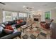 Comfortable living room with fireplace, and a seamless flow into the kitchen area at 240 Rose Ridge Dr, Canton, GA 30115