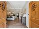 Bright foyer showcasing hardwood floors, a decorative table, and an open view into the kitchen at 2721 Old Concord Se Rd, Smyrna, GA 30082
