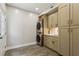 Convenient laundry room featuring modern appliances, sink, and plenty of storage space at 2721 Old Concord Se Rd, Smyrna, GA 30082