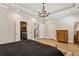 Serene bedroom retreat with hardwood floors, tray ceiling, natural light, and rustic wood furnishings at 2721 Old Concord Se Rd, Smyrna, GA 30082