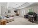 Inviting bedroom with a cozy seating area, a work space, and ample natural light from the windows at 7493 Elderberry Dr, Douglasville, GA 30135
