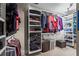 Custom walk-in closet with ample shelving, hanging space, and storage solutions at 7493 Elderberry Dr, Douglasville, GA 30135