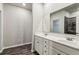 Elegant bathroom with double sinks, vanity, and a tiled shower at 2111 Wesson Ct, Kennesaw, GA 30144