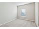 Cozy bedroom featuring neutral carpet and a window for natural light at 2111 Wesson Ct, Kennesaw, GA 30144