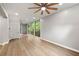 Finished basement with wood floors, recessed lighting, and large windows at 2828 Cloverhurst Dr, Atlanta, GA 30344