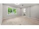 Bright bedroom with a neutral color scheme, carpeting, and an ensuite bathroom at 2828 Cloverhurst Dr, Atlanta, GA 30344