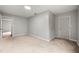 Neutral bedroom featuring new carpet, fresh paint, and a closet at 2828 Cloverhurst Dr, Atlanta, GA 30344