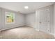 Comfortable bedroom featuring a neutral color scheme and a window at 2828 Cloverhurst Dr, Atlanta, GA 30344