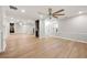 Open-concept living room featuring hardwood floors and recessed lighting at 2828 Cloverhurst Dr, Atlanta, GA 30344