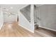 Open-concept room with hardwood floors, a staircase, and recessed lighting at 2828 Cloverhurst Dr, Atlanta, GA 30344