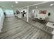 Open-concept living space featuring modern flooring, bright kitchen and comfortable seating area at 2346 Pryor Sw Rd, Atlanta, GA 30315