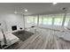 Bright living area with modern flooring, cozy fireplace and comfortable seating at 2346 Pryor Sw Rd, Atlanta, GA 30315