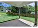 Covered patio that offers a view of the expansive, green backyard at 3599 Centerville Rosebud Rd, Snellville, GA 30039