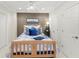 Comfortable bedroom featuring a wooden bed frame and cool-toned accents at 3640 Ridgeway Ter, Suwanee, GA 30024