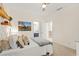 Cozy bedroom featuring a view of the water, comfortable carpeting and modern decor at 3640 Ridgeway Ter, Suwanee, GA 30024