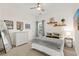 Bright bedroom with modern decor, comfortable bed and neutral colored walls at 3640 Ridgeway Ter, Suwanee, GA 30024