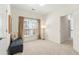 Cozy bedroom nook with natural light from the window and a comfortable bench at 3640 Ridgeway Ter, Suwanee, GA 30024