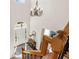 Bright foyer with a chandelier, hardwood floors, and a view of the front door at 3640 Ridgeway Ter, Suwanee, GA 30024