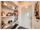 Organized entryway featuring built in shelving and coat hooks, perfect for storage and personal touches at 3777 Peachtree Ne Rd # 1335, Atlanta, GA 30319