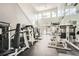 Bright gym with high ceilings, an array of modern weight machines, and natural light at 3777 Peachtree Ne Rd # 1335, Atlanta, GA 30319