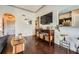 Cozy living space with hardwood floors, TV, decor, and an open entryway at 3777 Peachtree Ne Rd # 1335, Atlanta, GA 30319