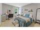 A bedroom with a work desk, a full-sized bed and neutral color scheme at 3798 Kirkwood Nw Run, Kennesaw, GA 30144