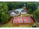Aerial view of the community pool, tennis courts, and clubhouse, enhancing lifestyle at 3798 Kirkwood Nw Run, Kennesaw, GA 30144
