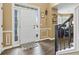 Bright entryway showcasing wood flooring, white trim, and a view into the adjacent rooms at 3798 Kirkwood Nw Run, Kennesaw, GA 30144