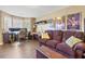 Living room with wood floors, a bay window, and ample space for relaxing and entertaining at 3798 Kirkwood Nw Run, Kennesaw, GA 30144