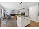 Open floorplan shows kitchen leading to a spacious living area with comfortable seating at 3798 Kirkwood Nw Run, Kennesaw, GA 30144