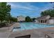 Community pool featuring many lounge chairs and a pool house for residents enjoyment at 3798 Kirkwood Nw Run, Kennesaw, GA 30144