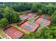 Aerial view of the community tennis courts, showing the layout and green surroundings at 3798 Kirkwood Nw Run, Kennesaw, GA 30144