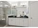 Beautiful bathroom featuring double vanity, granite counters, and glass-enclosed shower at 4206 Townsend Ln, Atlanta, GA 30346