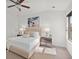 Bright bedroom with neutral carpet, ample lighting and a ceiling fan at 4206 Townsend Ln, Atlanta, GA 30346