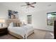 Cozy bedroom with plush carpet, neutral tones, and natural light from multiple windows at 4206 Townsend Ln, Atlanta, GA 30346
