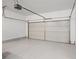 Garage with an epoxy floor and a large garage door at 4206 Townsend Ln, Atlanta, GA 30346
