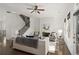 Spacious living room with fireplace, hardwood floors, staircase, and natural light at 4206 Townsend Ln, Atlanta, GA 30346
