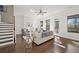 Spacious living room featuring hardwood floors, ample natural light, and stylish furniture for a comfortable living space at 4206 Townsend Ln, Atlanta, GA 30346