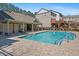 Sparkling pool is surrounded by community buildings and landscaping, offering a luxurious amenity for residents at 4206 Townsend Ln, Atlanta, GA 30346