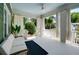 Inviting outdoor space with white furniture and natural light for relaxation and enjoying the neighborhood views at 1545 Montreat Sw Pl, Atlanta, GA 30311