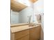 Bright bathroom with a big mirror, wooden cabinets, and a clean, modern design at 170 Boulevard Se # 521H, Atlanta, GA 30312