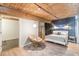 Comfortable bedroom featuring a wooden ceiling, stylish decor, and ample natural light at 170 Boulevard Se # 521H, Atlanta, GA 30312