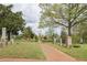 Scenic view of historic cemetery with brick path, monuments, and distant smokestacks at 170 Boulevard Se # 521H, Atlanta, GA 30312