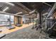 Spacious gym featuring modern equipment, exposed brick, and ample lighting for a great workout experience at 170 Boulevard Se # 521H, Atlanta, GA 30312