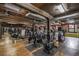 Bright gym with various machines, mirrored wall, and exposed beams for a rustic, industrial feel at 170 Boulevard Se # 521H, Atlanta, GA 30312