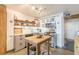 Modern kitchen with stainless steel appliances, wooden accents, and open shelving at 170 Boulevard Se # 521H, Atlanta, GA 30312