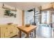 Open kitchen area with a wood table, spiral staircase, and decor at 170 Boulevard Se # 521H, Atlanta, GA 30312